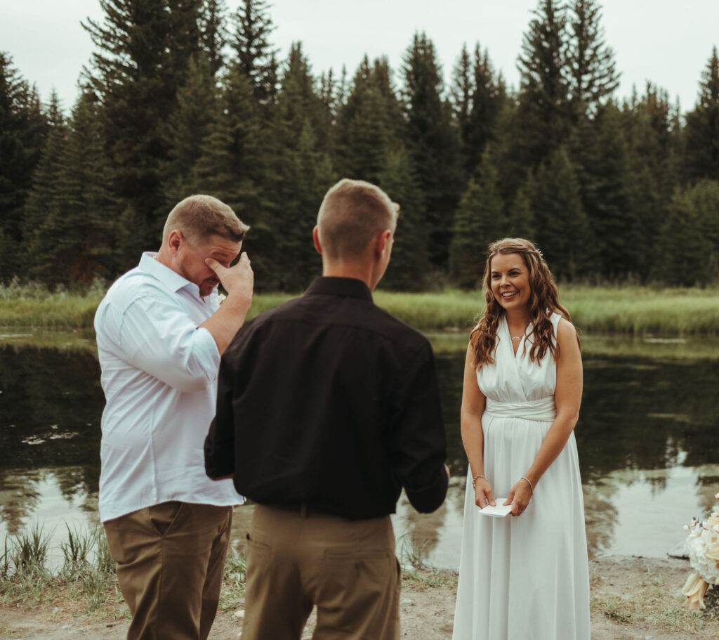 Bride and groom at Schwabacher Landing during Grand Teton elopement