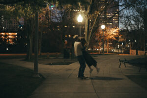 Movie inspired engagement photos at night in the city.