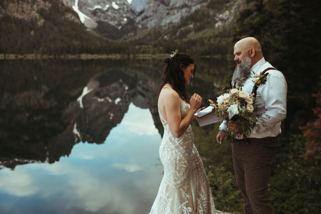 Couple exchanging vows at Grand Teton wedding