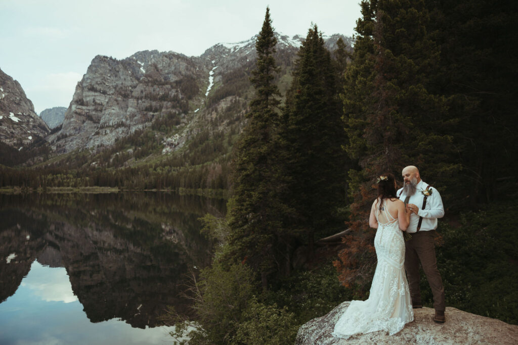 Grand Teton wedding ceremony with mountain backdrop