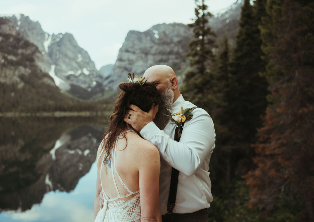 Bride and groom kiss at Grand Teton wedding