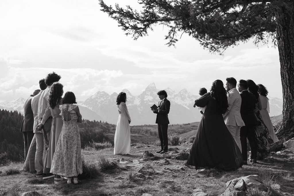 couple exchanging vows at the wedding tree in jackson hole