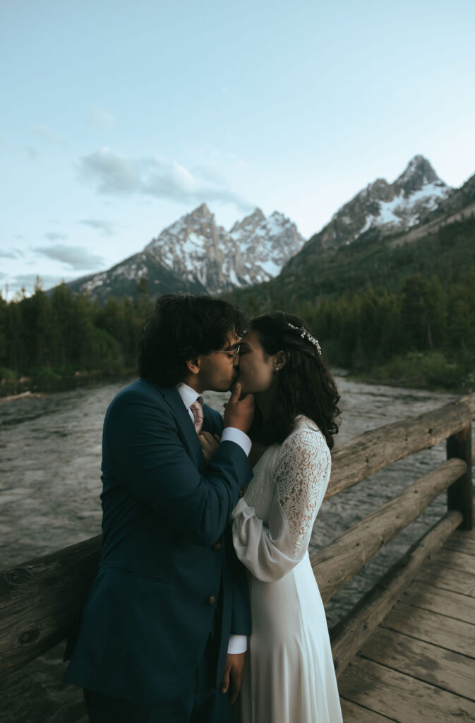 bride and groom at their wedding in jackson hole wyoming at the wedding tree