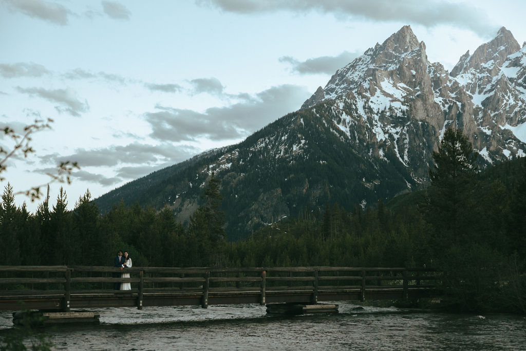 bride and groom at their grand teton elopement near the wedding tree