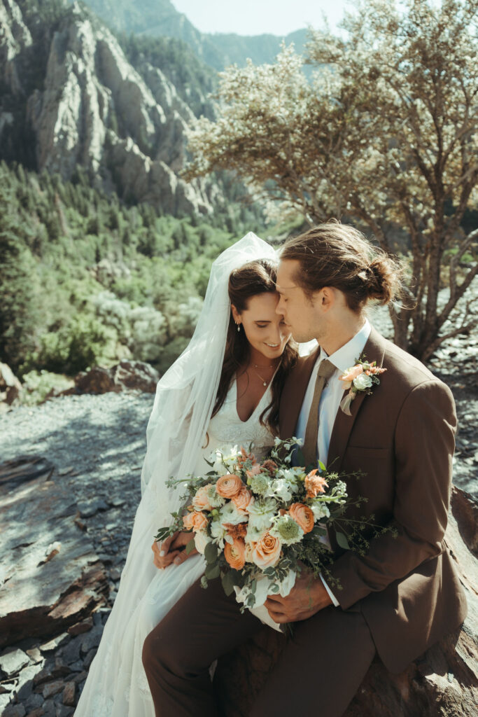 bride and groom at their brighton wedding with mountains in the background