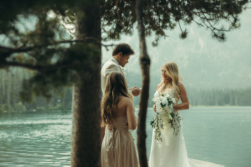 A Taggart Lake elopement ceremony, picturing a couple getting married in the Tetons.