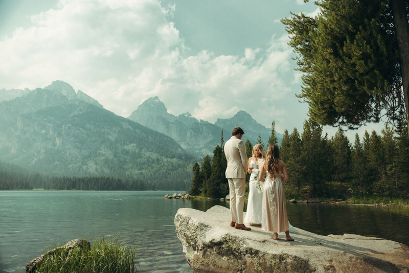 A Taggart Lake elopement ceremony, picturing a couple getting married in the Tetons.